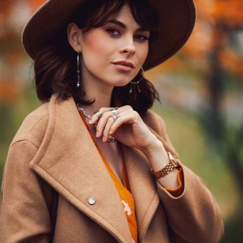 stylish personal photoshoot autumn woman in hat