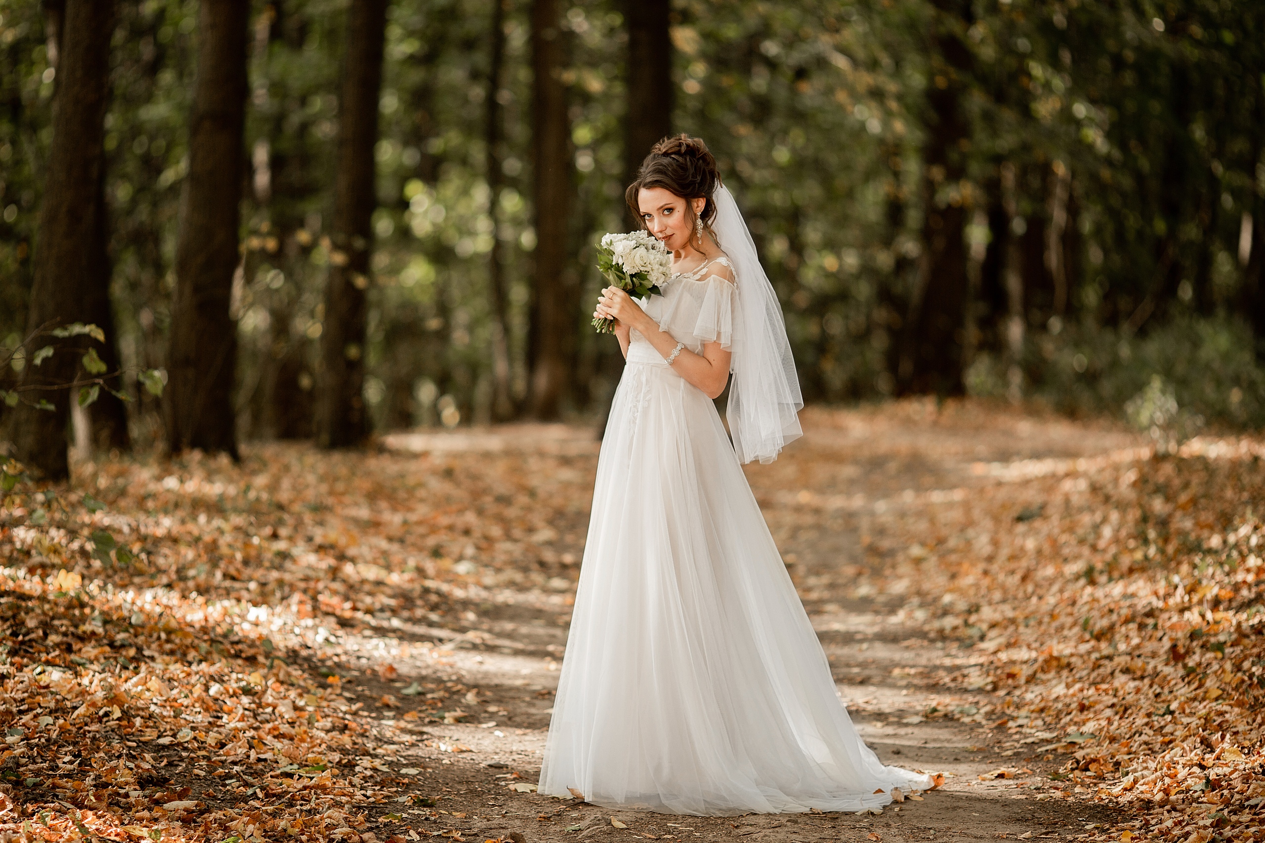 Wedding photoshoot bride stands
